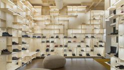 Square play: Architect kits out store with plywood shelves as disrupted grid