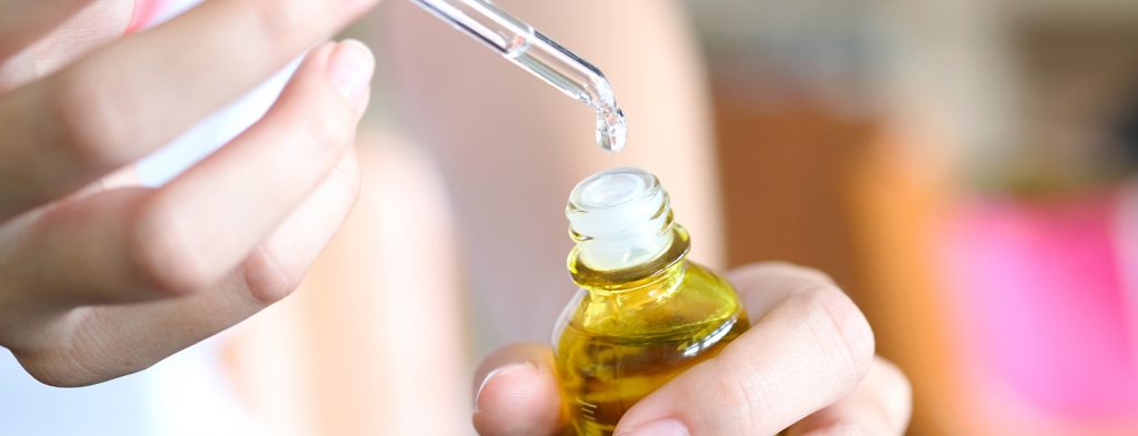 Woman using serum